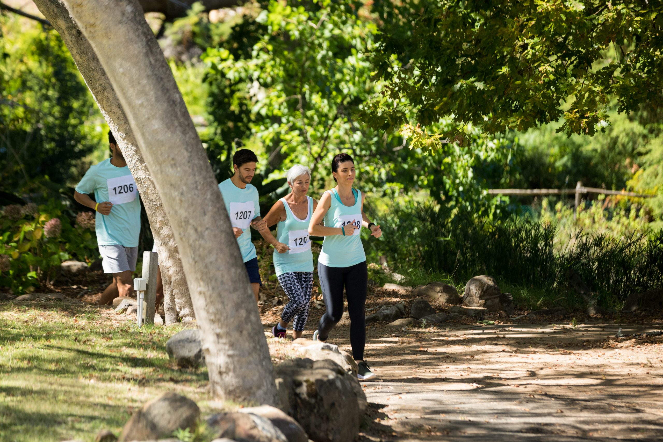 Determined marathon athletes running in the park